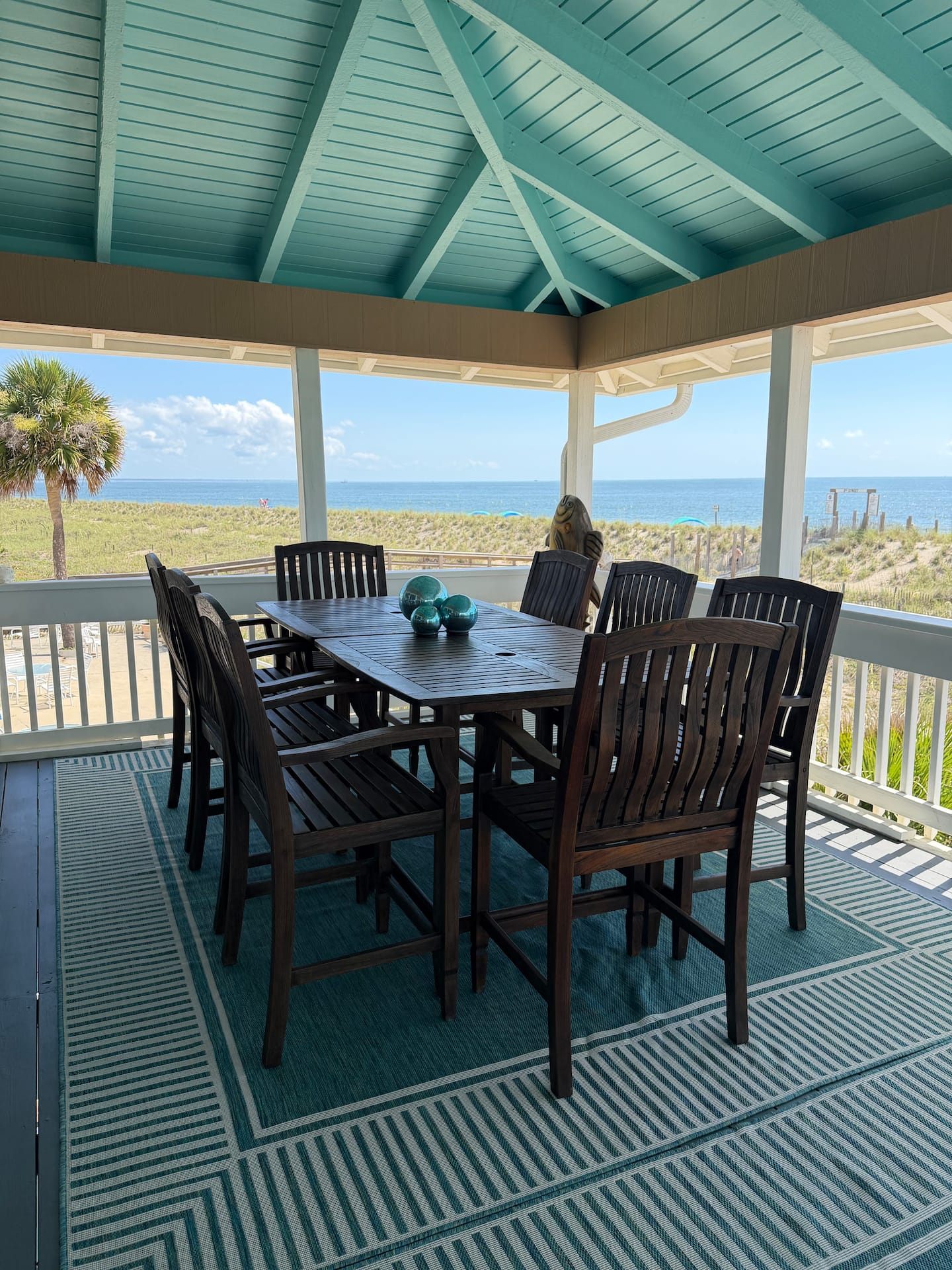 Oceanfront dining balcony at 10 Steps to the Beach
